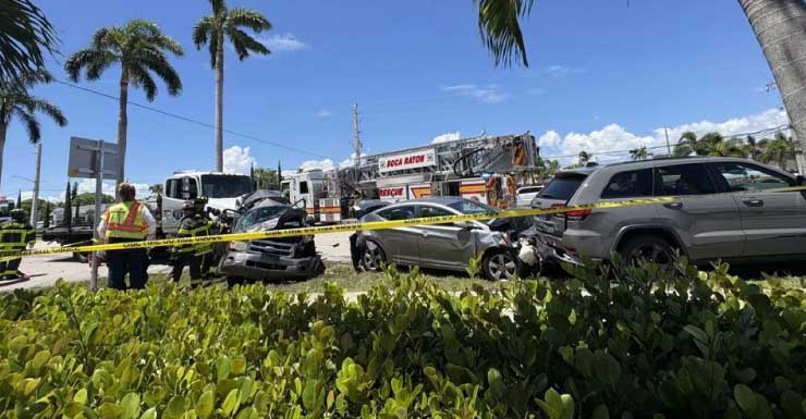 Homem morre após caminhão-reboque colidir com carros parados em semáforo em Boca Raton